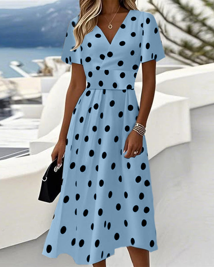 Robe élégante en coupe A avec col V et pois