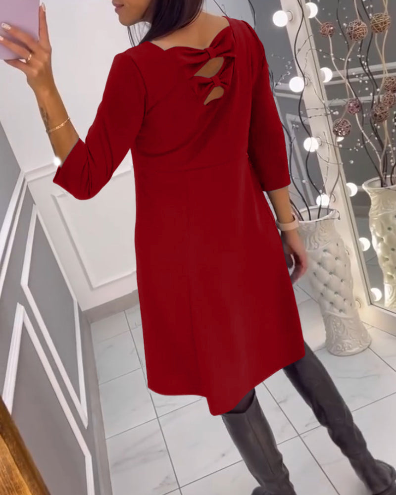 Robe unie avec nœud au dos