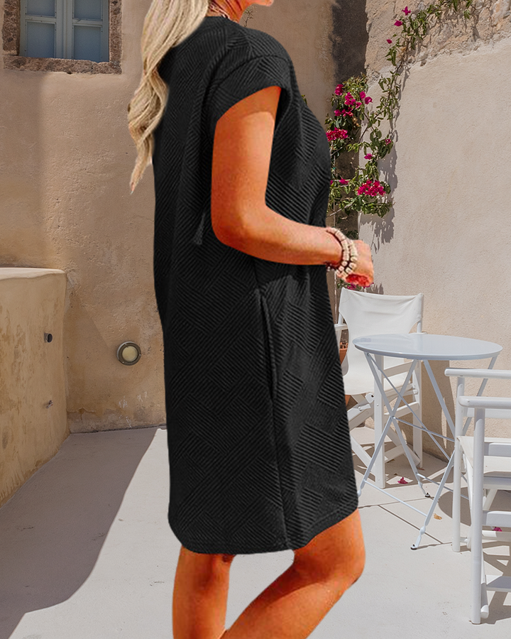 Robe à manches courtes et poche à col rond