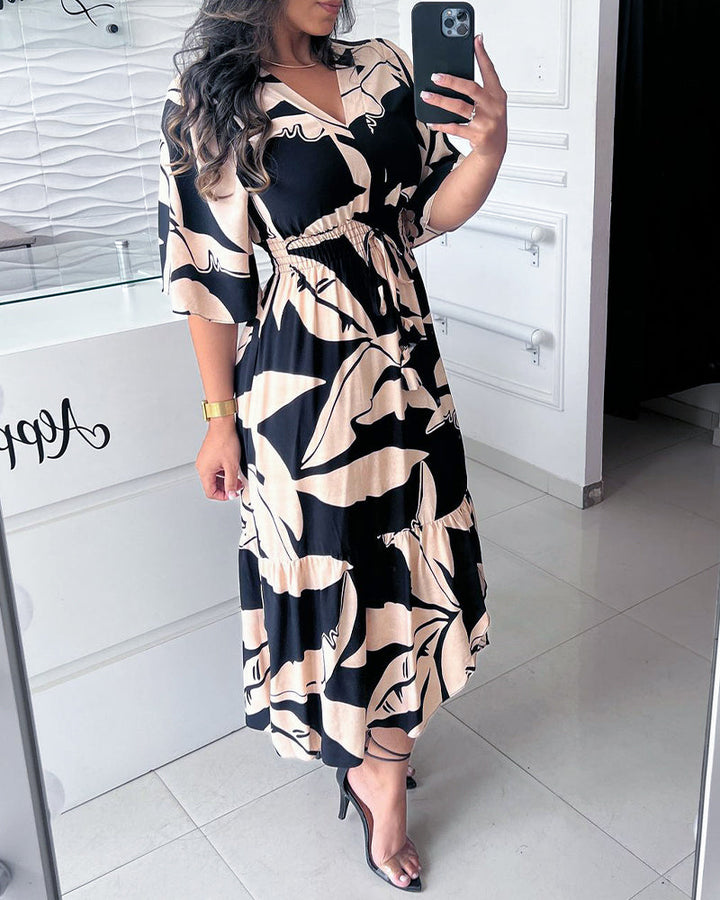 Robe élégante à col en V, manches trois-quarts et cordon de serrage