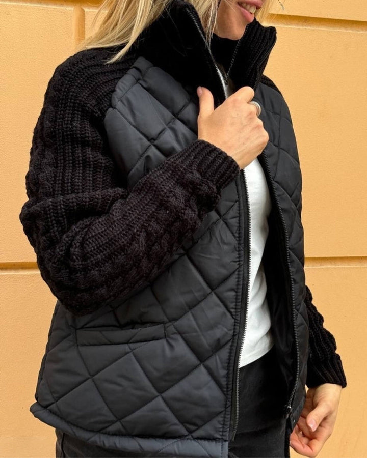 Manteau zippé à col haut de couleur unie