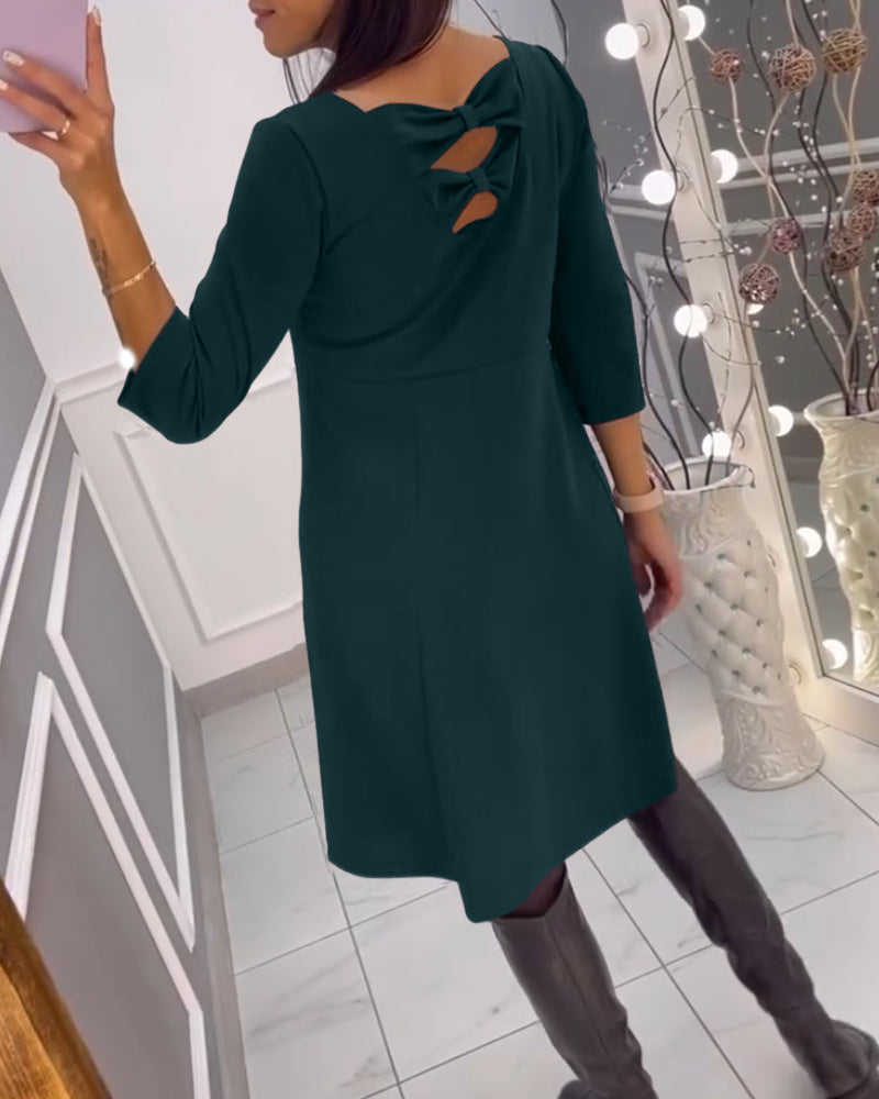 Robe unie avec nœud au dos