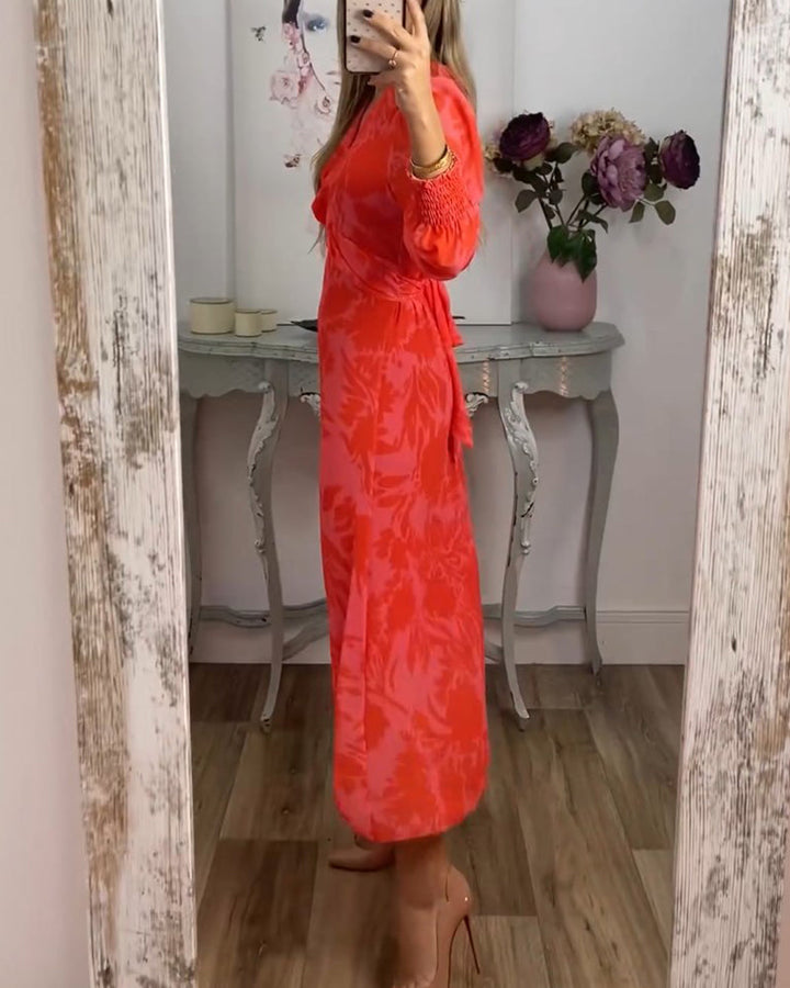 Robe avec col en V et taille cintrée