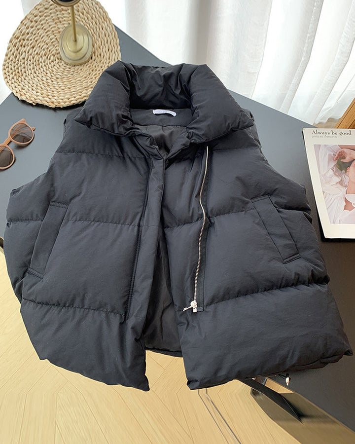 Veste matelassée simple sans manches avec poche zippée de couleur unie