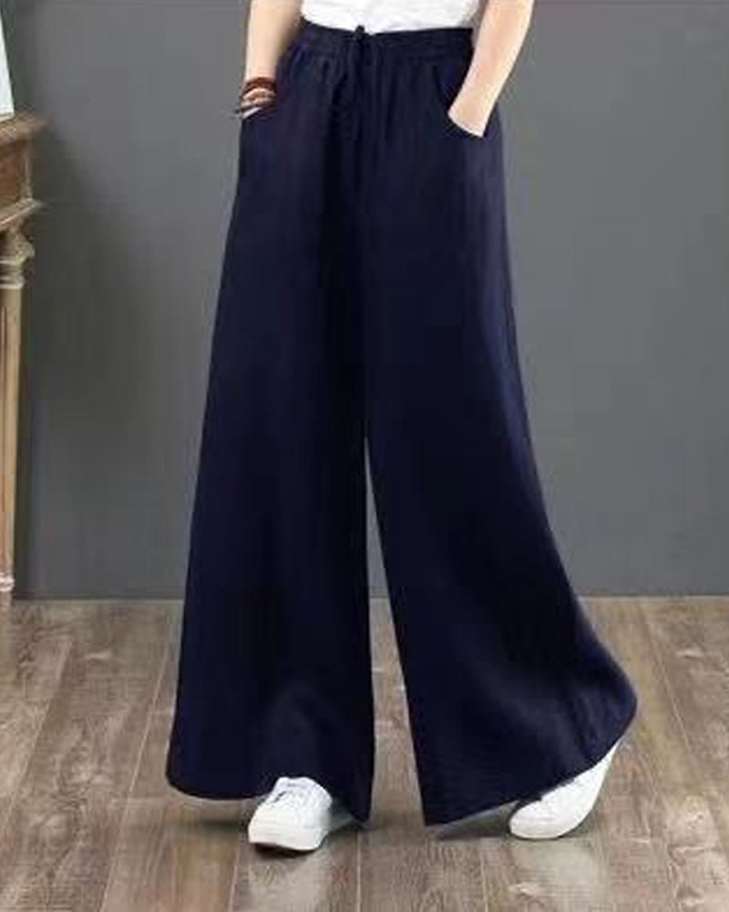 Pantalon large taille haute de couleur unie