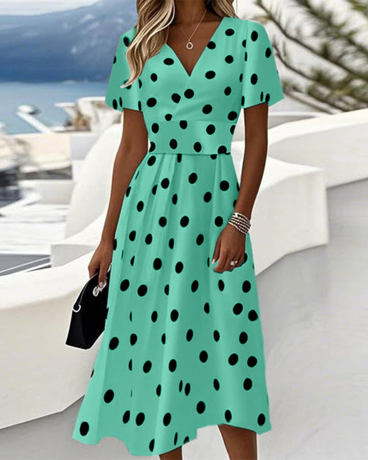 Robe élégante en coupe A avec col V et pois