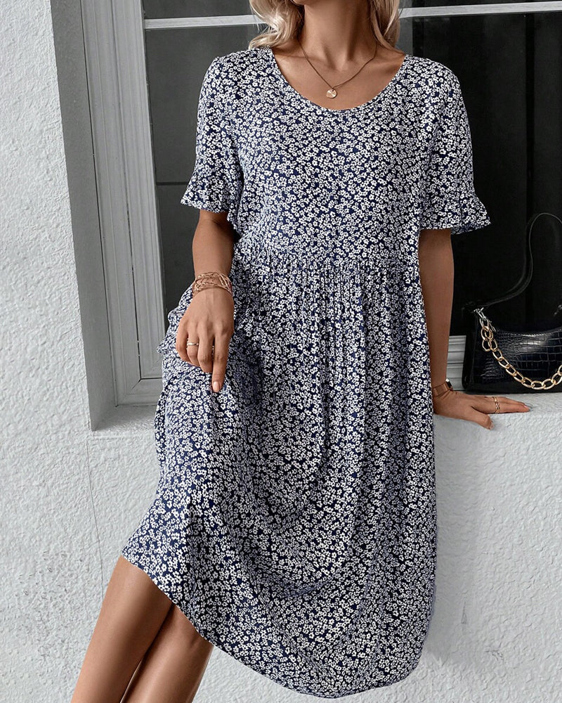 Robe élégante à col rond et imprimé floral