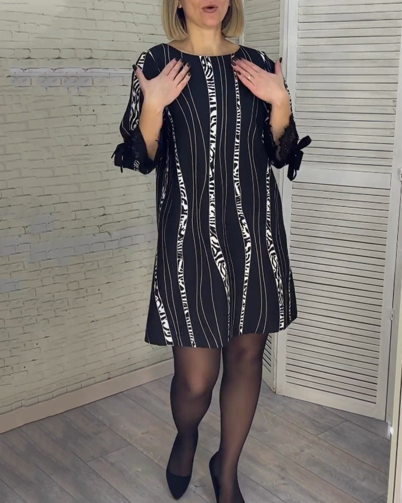 Robe mi-longue à rayures